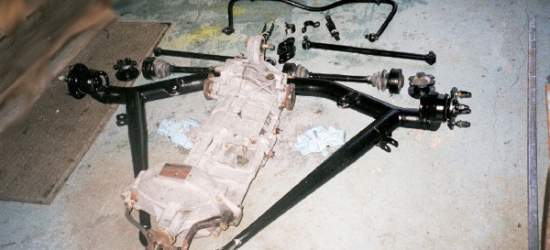 Gearbox unit and rear suspension